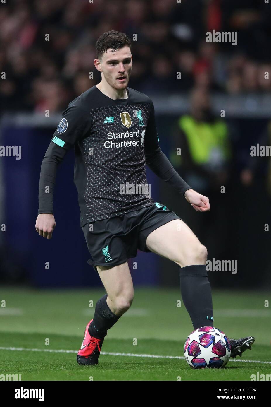 Liverpool's Andrew Robertson during the UEFA Champions League round of 16 first leg match at Wanda Metropolitano, Madrid. Stock Photo