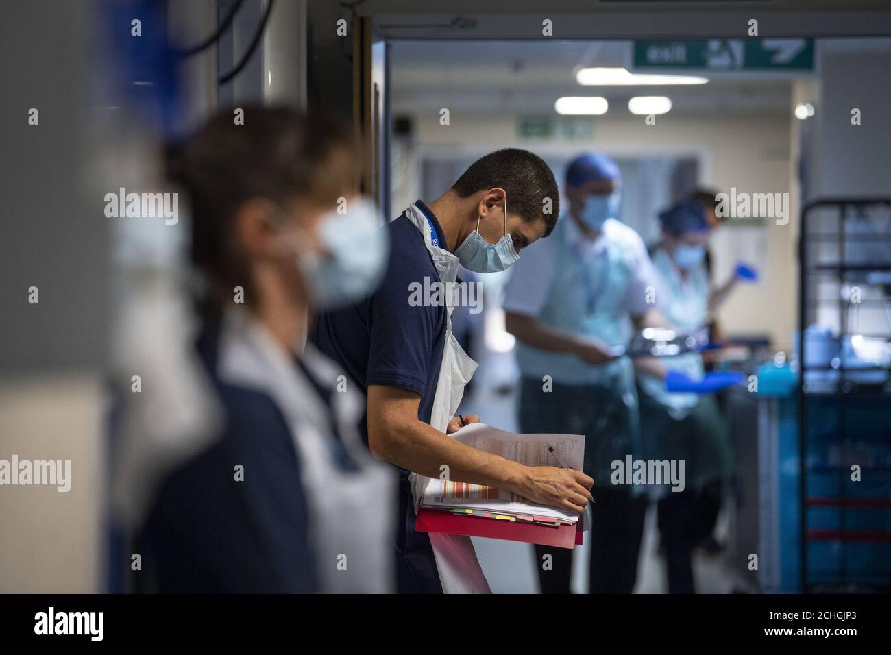 EMBARGOED TO 0001 FRIDAY MAY 29 A Rehab Support worker checks on