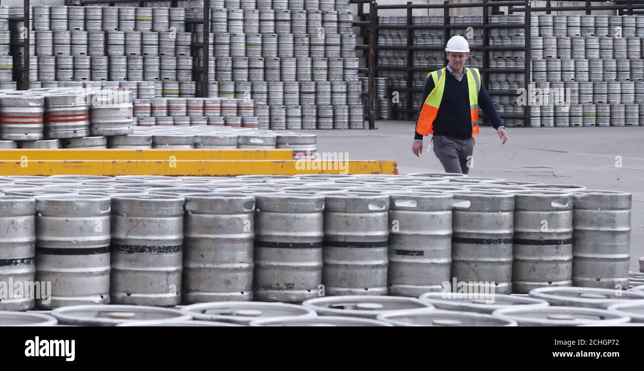 Embargoed to 0001 Wednesday June 24 Logistics Manager Colin Griffey with Kegs of Guinness stacked ready for distribution at the St James's Gate Guinness brewery in Dublin as production ramps up in preparation for bars re-opening in the UK and Ireland. Stock Photo