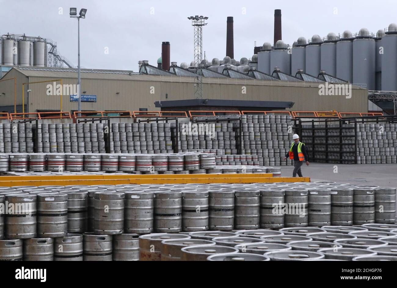 Logistics Manager Colin Griffey with Kegs of Guinness stacked ready for distribution at the St James's Gate Guinness brewery in Dublin as production ramps up in preparation for bars re-opening in the UK and Ireland. Stock Photo