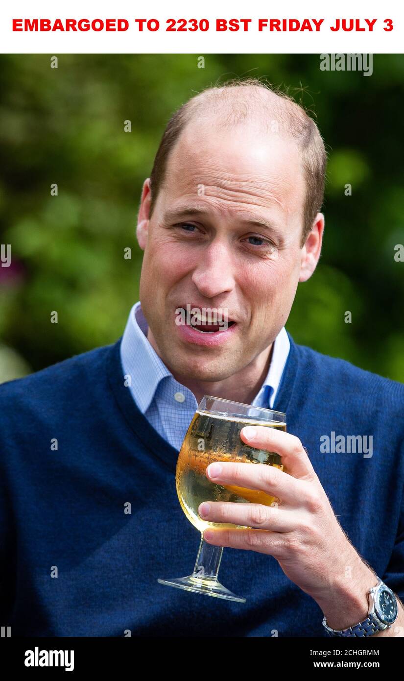 EMBARGOED TO 2230 BST FRIDAY JULY 3 The Duke of Cambridge takes a sip of an Aspalls cider at The Rose and Crown pub in Snettisham, Norfolk. Stock Photo