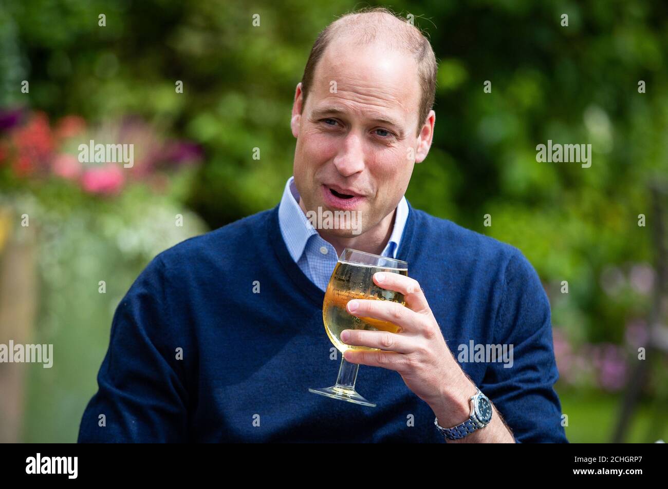 The Duke of Cambridge takes a sip of an Aspalls cider at The Rose and Crown pub in Snettisham, Norfolk. Stock Photo