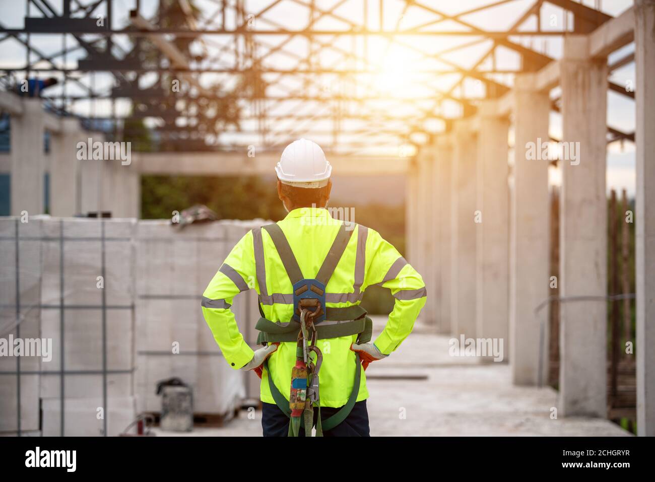 Behind Engineering with uniform safety  in the construction site Stock Photo