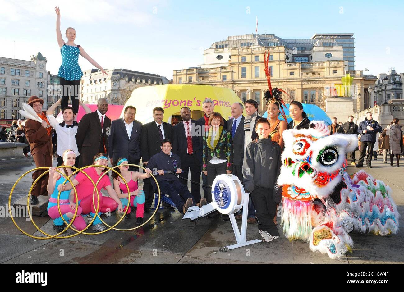 Performers from The Circus Space surround Ozwald Boateng, menswear designer, Iqbal Wahhab, restaurateur, James Caan, a Dragon's Den millionaire, Lord Coe, Chairman of the London 2012 Organising Committee, Manny Lewis, Chief Executive of the London Development Agency, Jonathan Edwards , former European and World triple jump champion, Tessa Jowell, Olympic Minister, Mayor of London, Ken Livingstone, Giles Long, ex Paralympic swimmer, Thomas Daley, 13, a diving prodigy from Plymouth, Simone Griffith , a Notting Hill carnival dancer and Shenaze Reade, 19, a world -class cycling champion.(L to R).  Stock Photo
