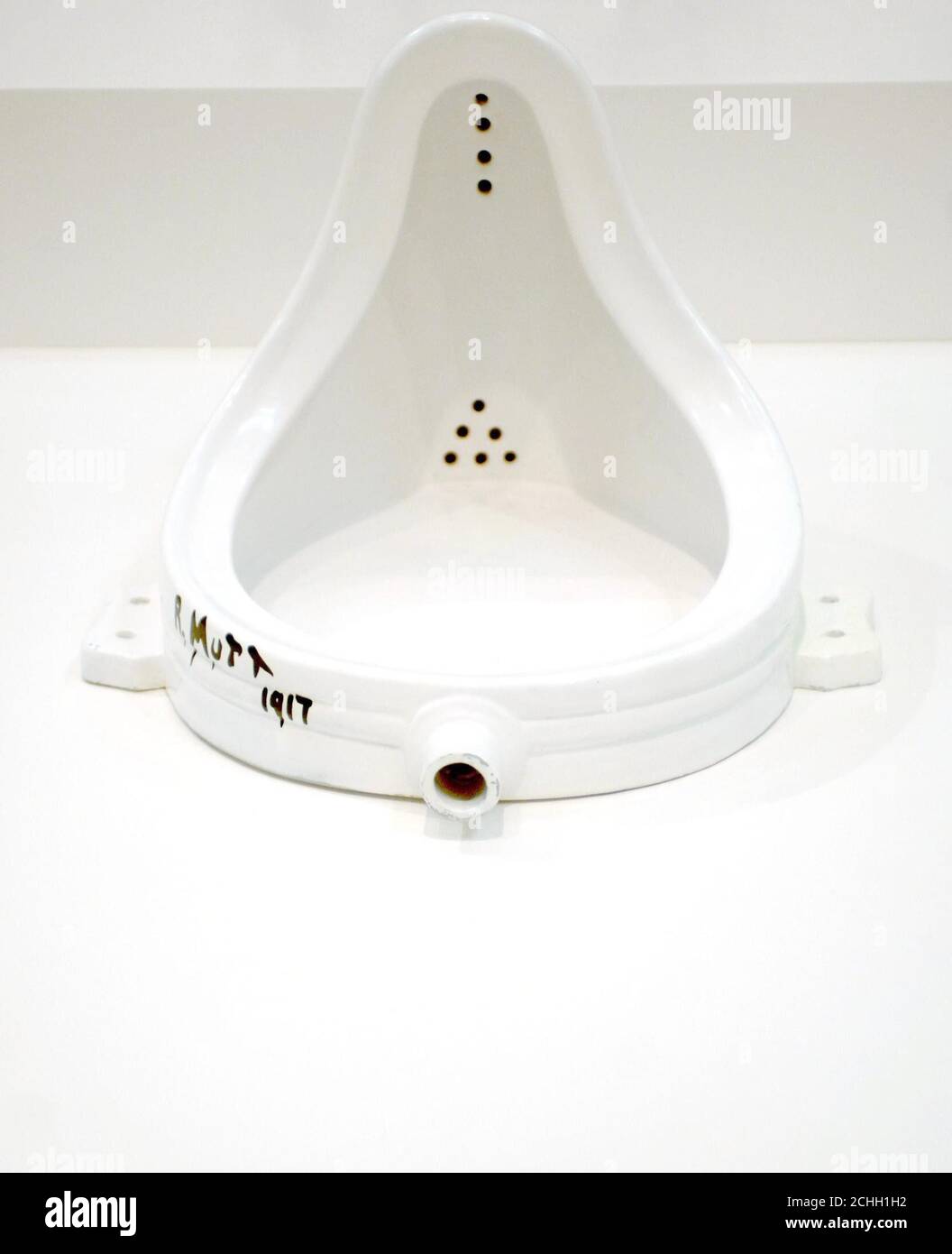 Duchamp's Fountain, in the Tate Modern, London, which is part of the gallery's Duchamp, Man Ray and Picaba exhibition which runs from February 21 to May 26, 2008. Stock Photo