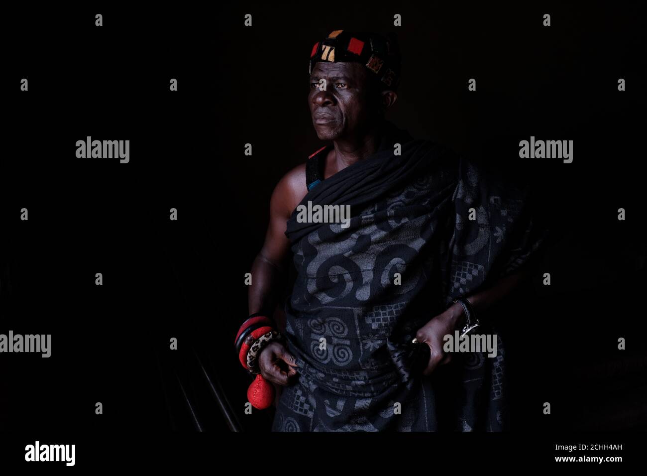 Nana Assenso, 68, chief of Adidwan, a village in Ghana's interior, looks on before visiting the grave of his uncle Kwame Badu, in Adidwan, Ashanti Region, Ghana, July 21, 2019. His uncle's Nana Assenso, 68, chief of Adidwan, a village in Ghana's interior, looks on before visiting the grave of his uncle Kwame Badu, in Adidwan, Ashanti Region, Ghana, July 21, 2019. His uncle's