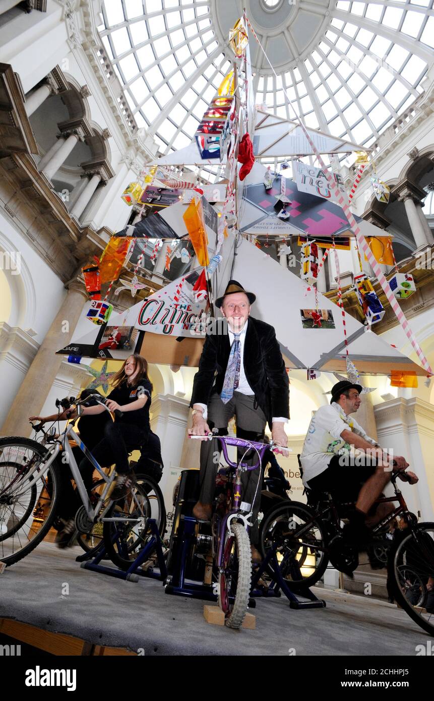 Artist Bob and Roberta Smith with his latest artwork, an interactive Christmas tree titled Make Your Own Xmas at the Tate Britain, central London.   Stock Photo