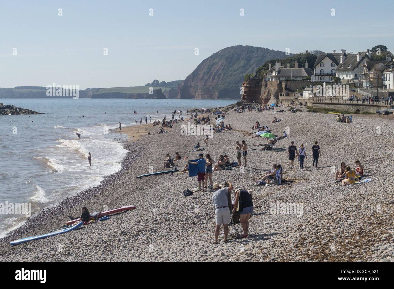 Sidmouth, Devon, 14th Sept 2020 Fabulous weather with temperatures in the 80's on the Devon coast brought lots of visitors to Sidmouth, all happy to keep their distance on the beach within the new 'Rule Of Six' conditions. Credit: Photo Central/Alamy Live News Stock Photo