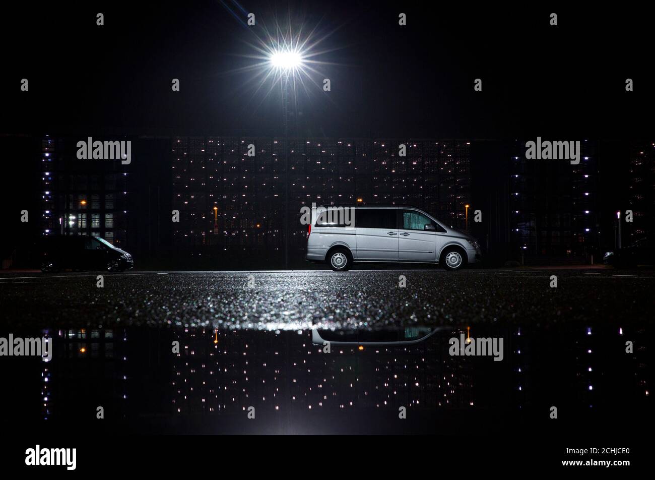 A Mercedes Benz Viano Van Is Parked At Night Below The Spotlight Of A Construction Site At A Parking Lot Running Along The River Spree Embankment In Berlin November 18 2013 Reuters Thomas Peter