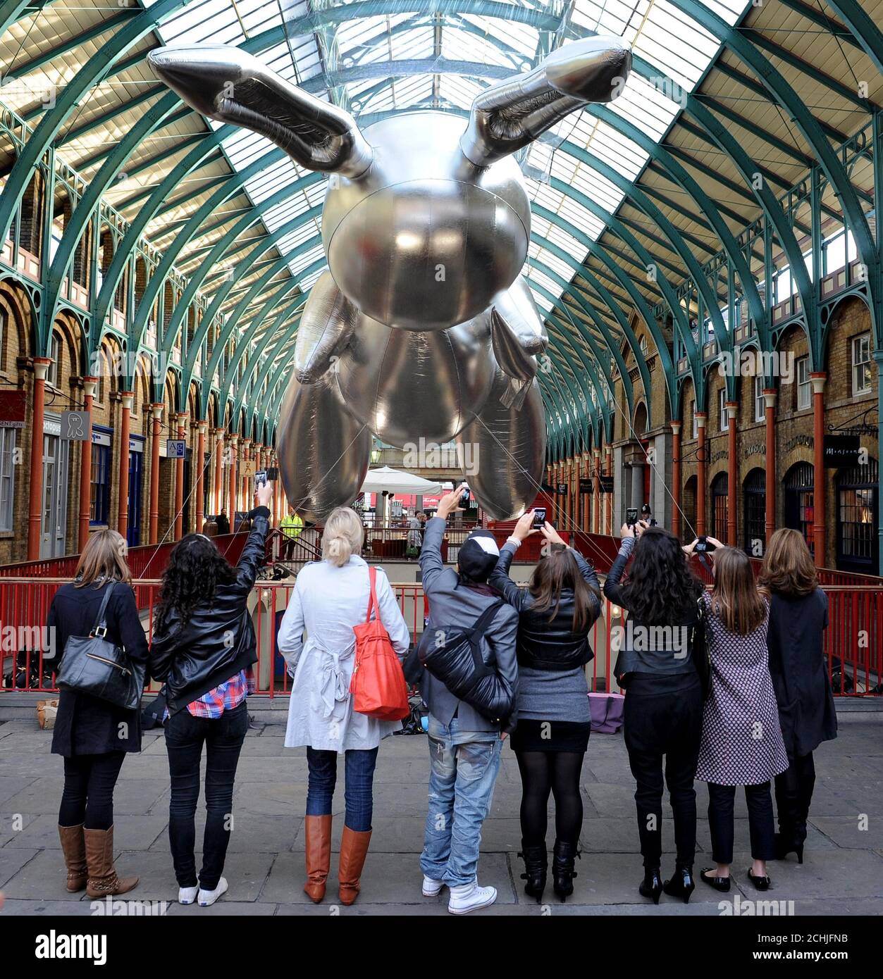 Artist Jeff Koons' giant 53 foot rabbit balloon is exhibited in Covent Garden Market to publicise Pop Life: Art in a Material World at Tate Modern, London. Stock Photo