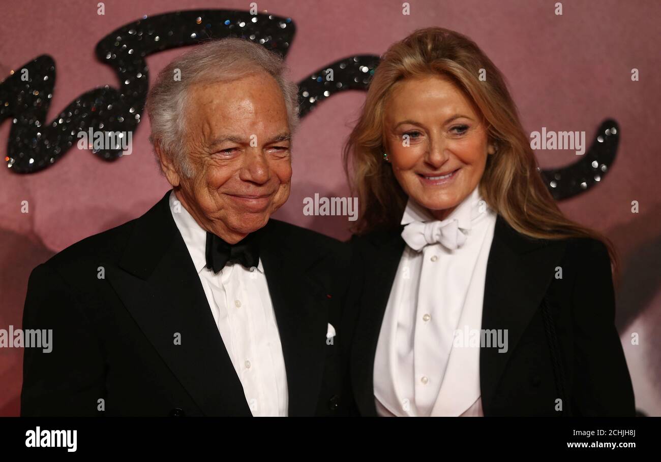 Designer Ralph Lauren (L) and his wife Ricky Anne Loew-Beer pose for  photographers at the Fashion Awards 2016 in London, Britain December 5,  2016. REUTERS/Neil Hall Stock Photo - Alamy