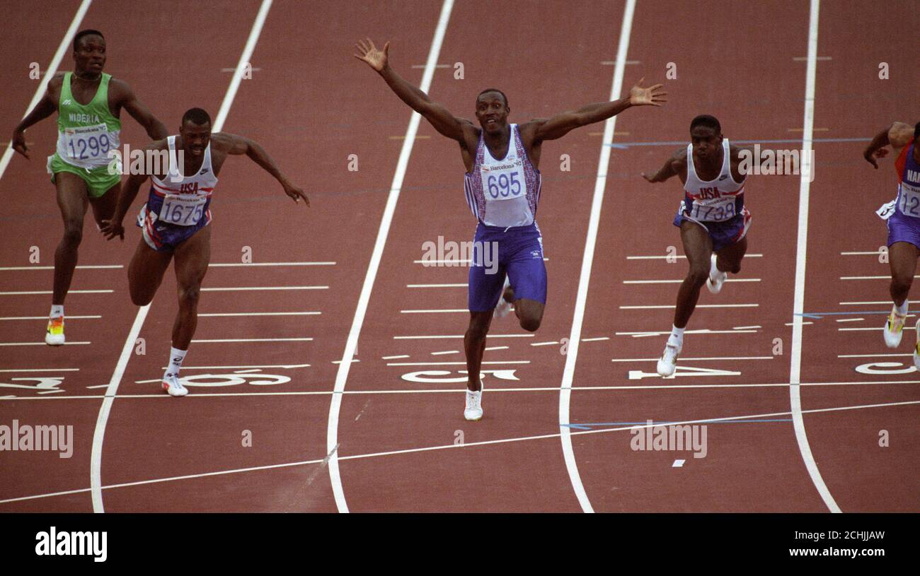 Golden glory for Linford Christie as he wins the 100m Olympic title in Barcelona from Leroy Berel (r) and Dennis Mitchell. Stock Photo