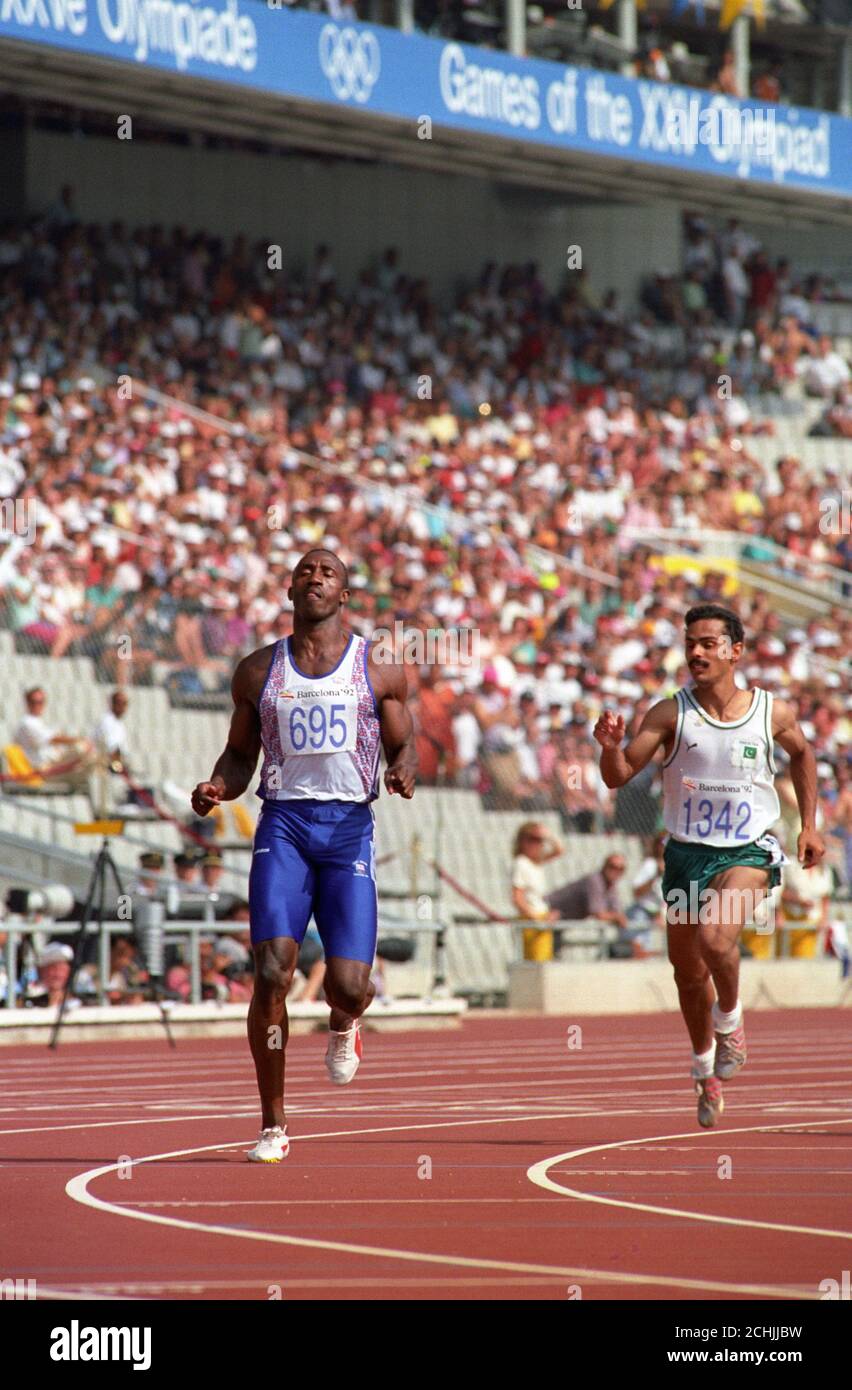 Linford Christie cruises to an easy victory in his Heat of the 100m in the Olympic Stadium, Barcelona. Stock Photo
