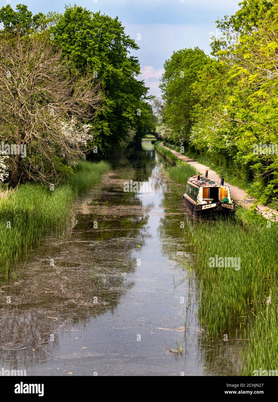 A barge or narrowboat on the Leicester Line of the Grand Union Canal near Foxton Locks, Leicestershire, England, UK Stock Photo