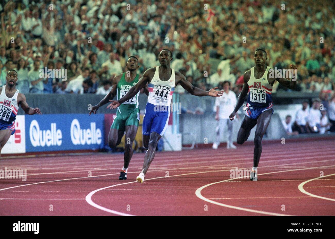 Linford Christie takes a corner in Heat ahead of Carl Lewis in Stuttgart during the World Championships. Stock Photo