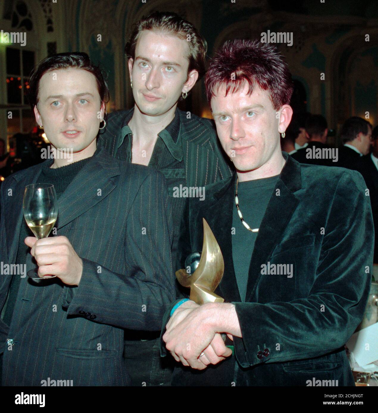 Three members of the pop group Suede after being awarded the Mercury Music Prize. (L-R) Lead singer Brett Anderson, bassist Mat Osman and drummer Simon Gilbert. Stock Photo