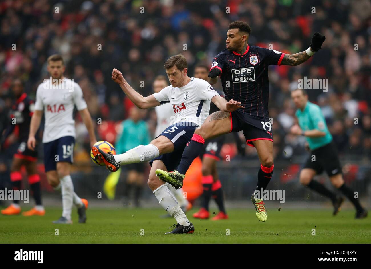 Soccer Football - Premier League - Tottenham Hotspur vs Huddersfield Town - Wembley Stadium, London, Britain - March 3, 2018   Huddersfield Town’s Danny Williams in action with Tottenham's Jan Vertonghen    REUTERS/Eddie Keogh    EDITORIAL USE ONLY. No use with unauthorized audio, video, data, fixture lists, club/league logos or 'live' services. Online in-match use limited to 75 images, no video emulation. No use in betting, games or single club/league/player publications.  Please contact your account representative for further details. Stock Photo