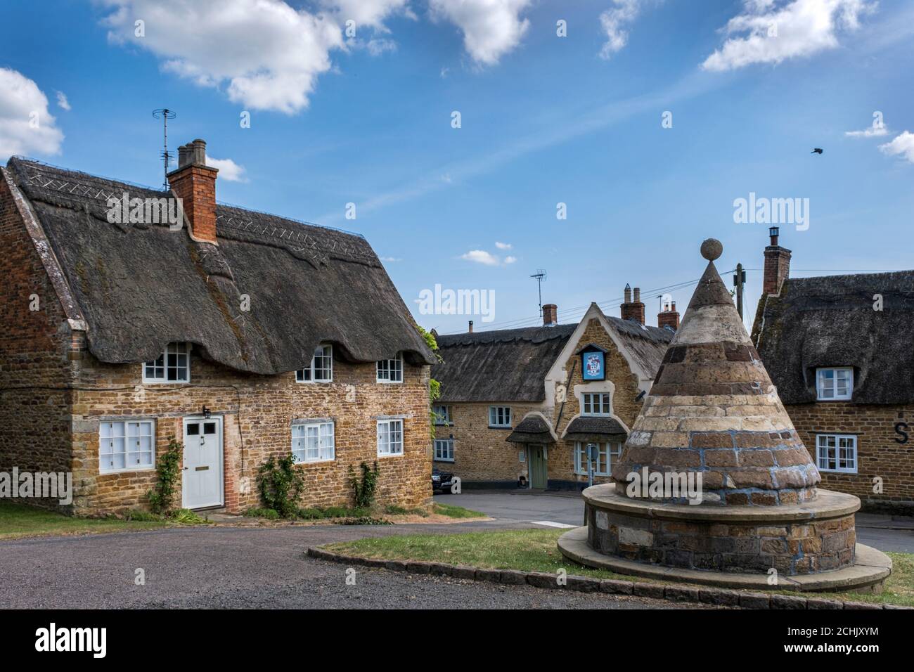 The Buttercross on the village green, Hallaton, Leicestershire, England, UK Stock Photo