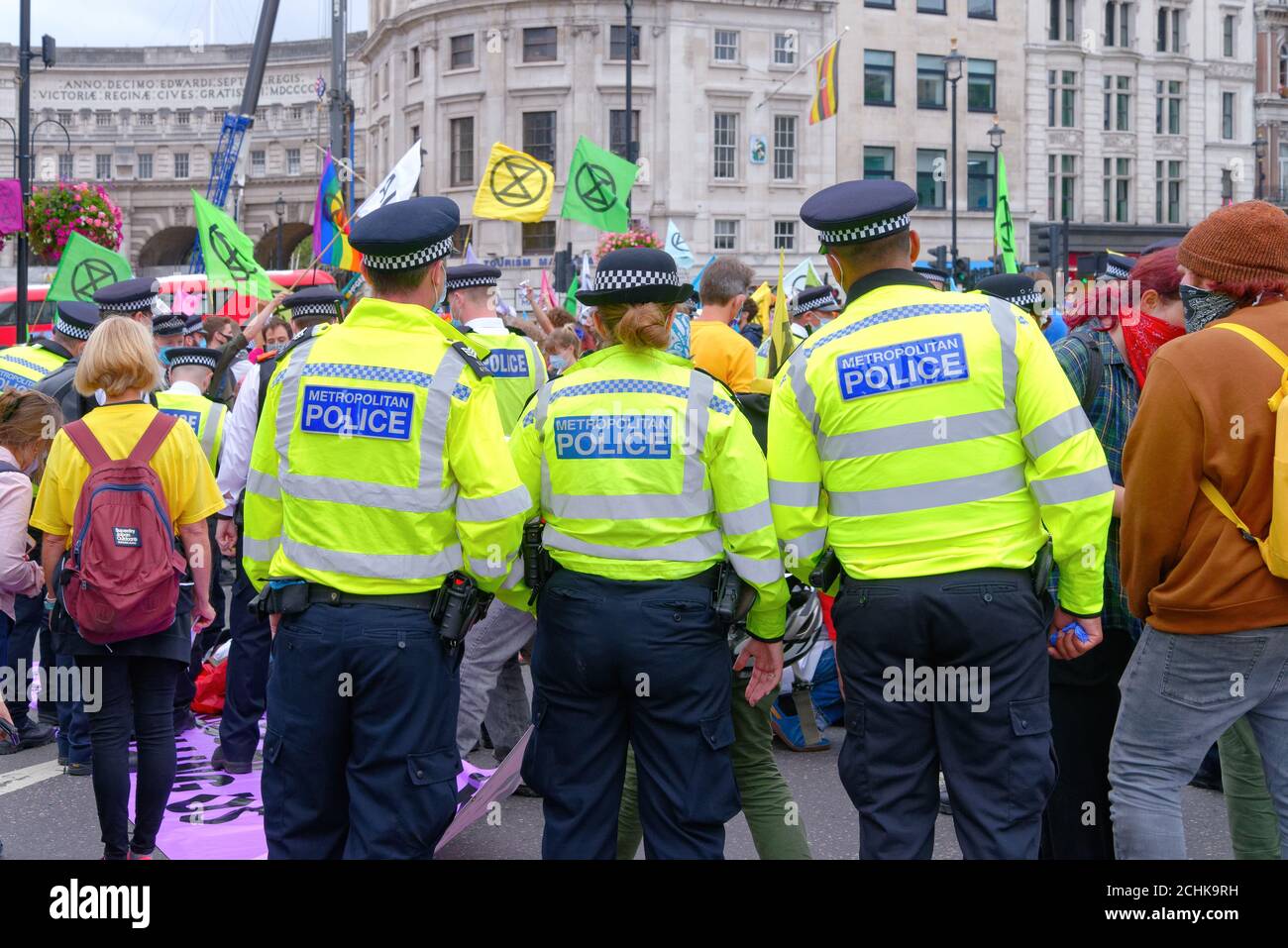 Metropolitan police controlling a demonstration by Extinction Rebellion in central London England UK Stock Photo