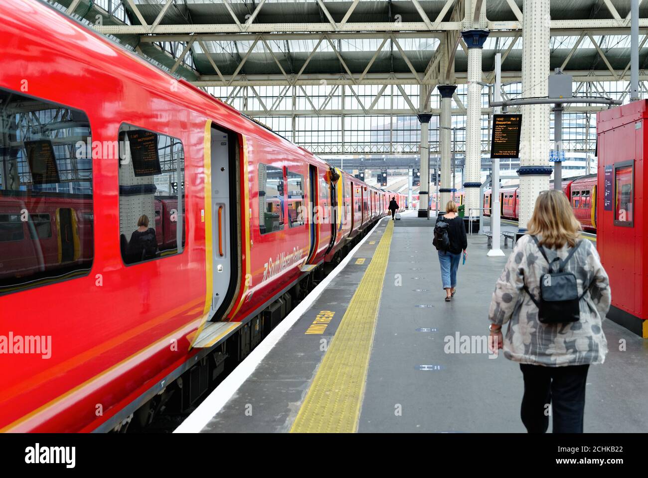 A South Western Railway commuter train on platform at Waterloo station London England UK Stock Photo