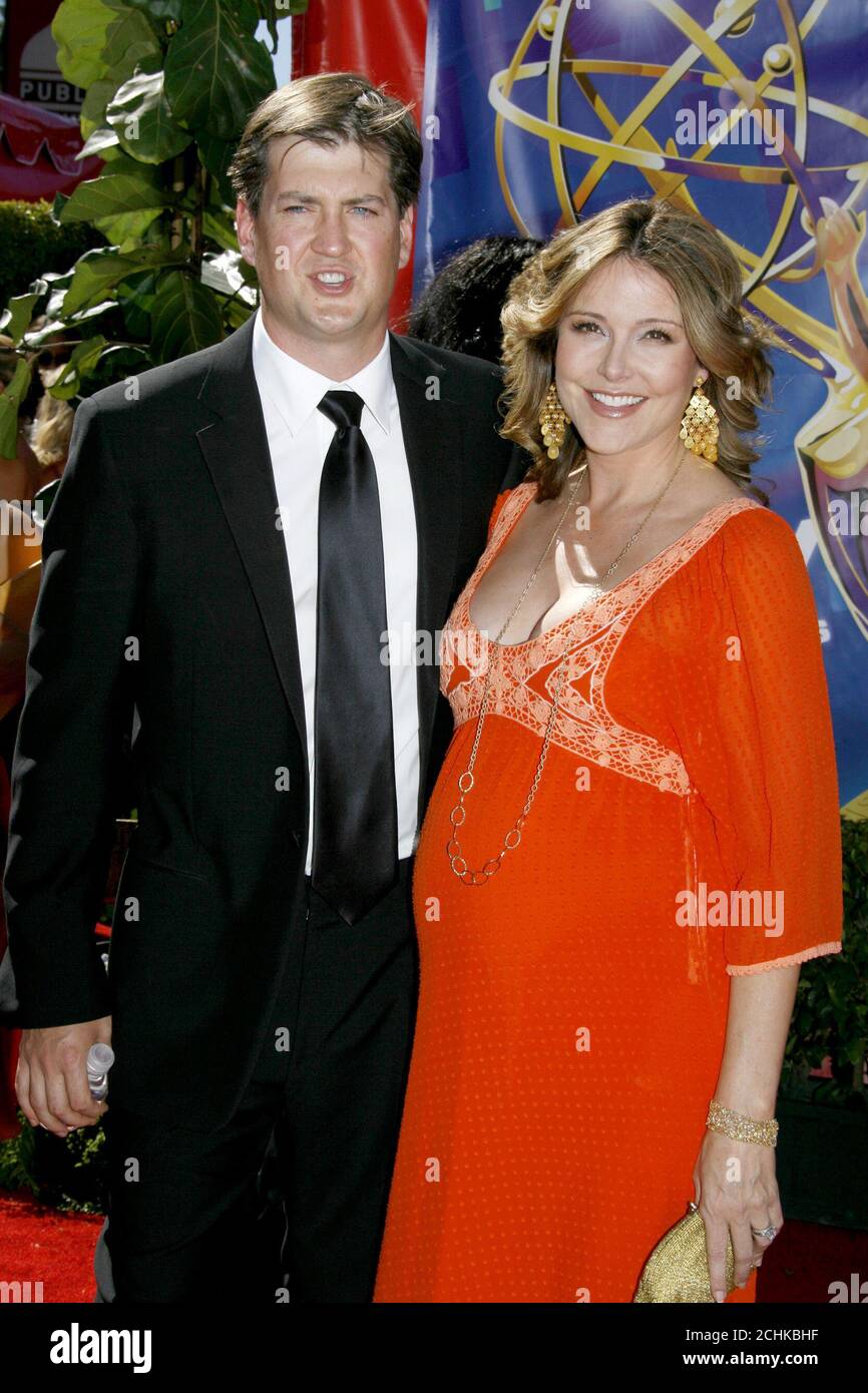 Actress Christa Miller (R) and her husband, Bill Lawrence arrive at the