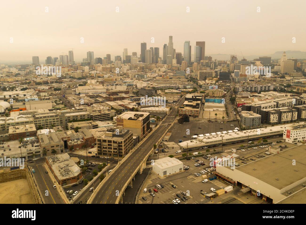 Aerial views of a sepia toned downtown Los Angeles during the 2020 wildfire crisis filling the local skies with smoke Stock Photo