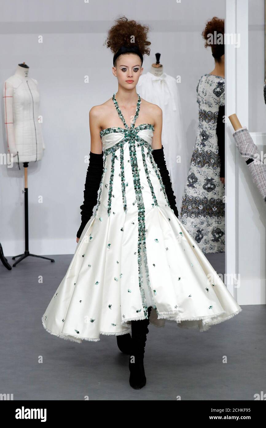 A presents a creation by German designer Karl Lagerfeld as of his Haute Couture