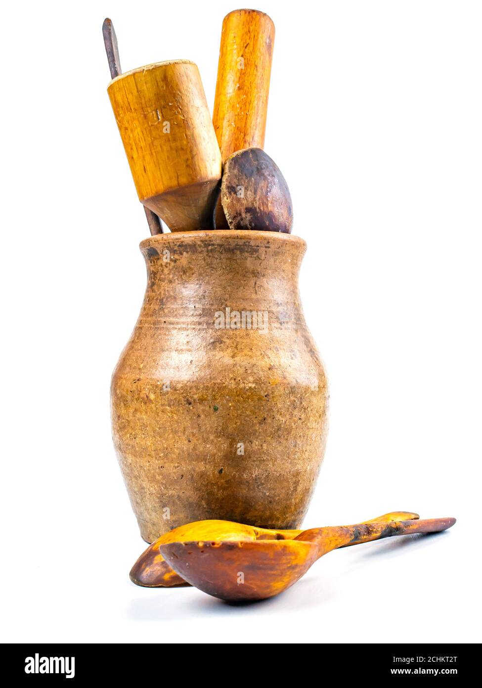 Ceramic clay jug with wooden kitchen utensils Stock Photo Alamy