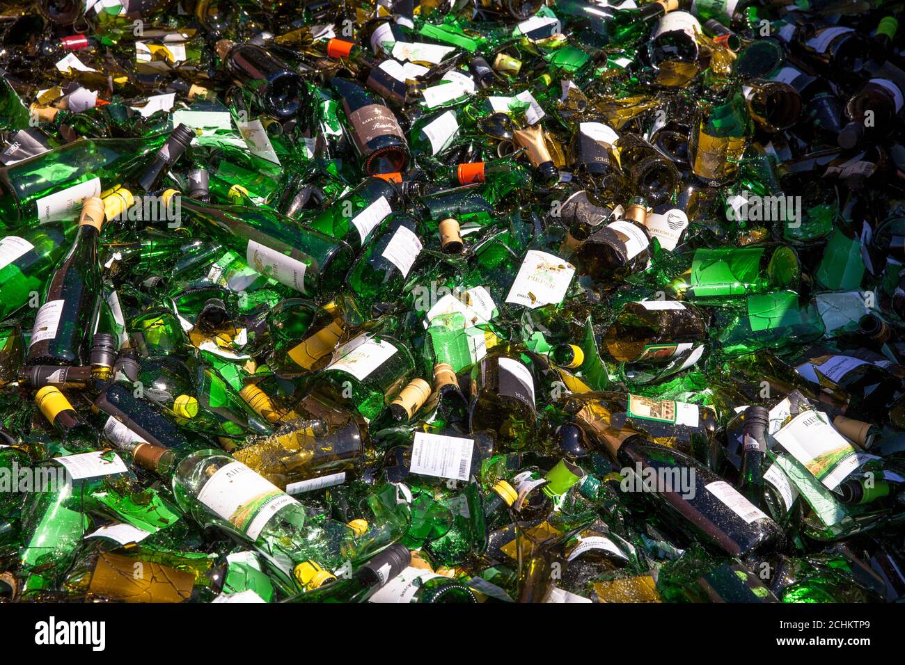 old glass of green wine bottles at a winery in Koenigswinter, North Rhine-Westphalia, Germany.  Altglas gruener Weinflaschen an einem Weingut in  Koen Stock Photo