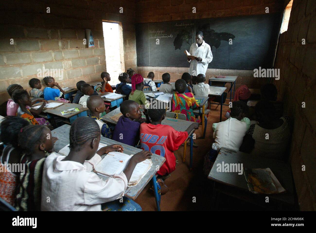 Malian Pupils Listen During A French Language Lesson In Mali S Capital Bamako June 15 2005 The
