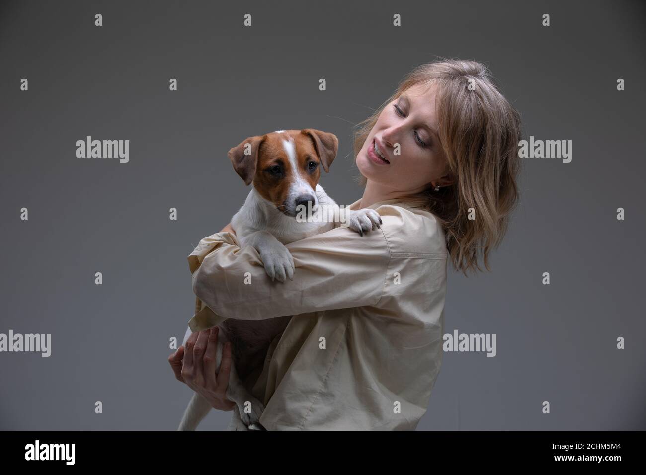 Puppy on shoulder hi-res stock photography and images - Alamy
