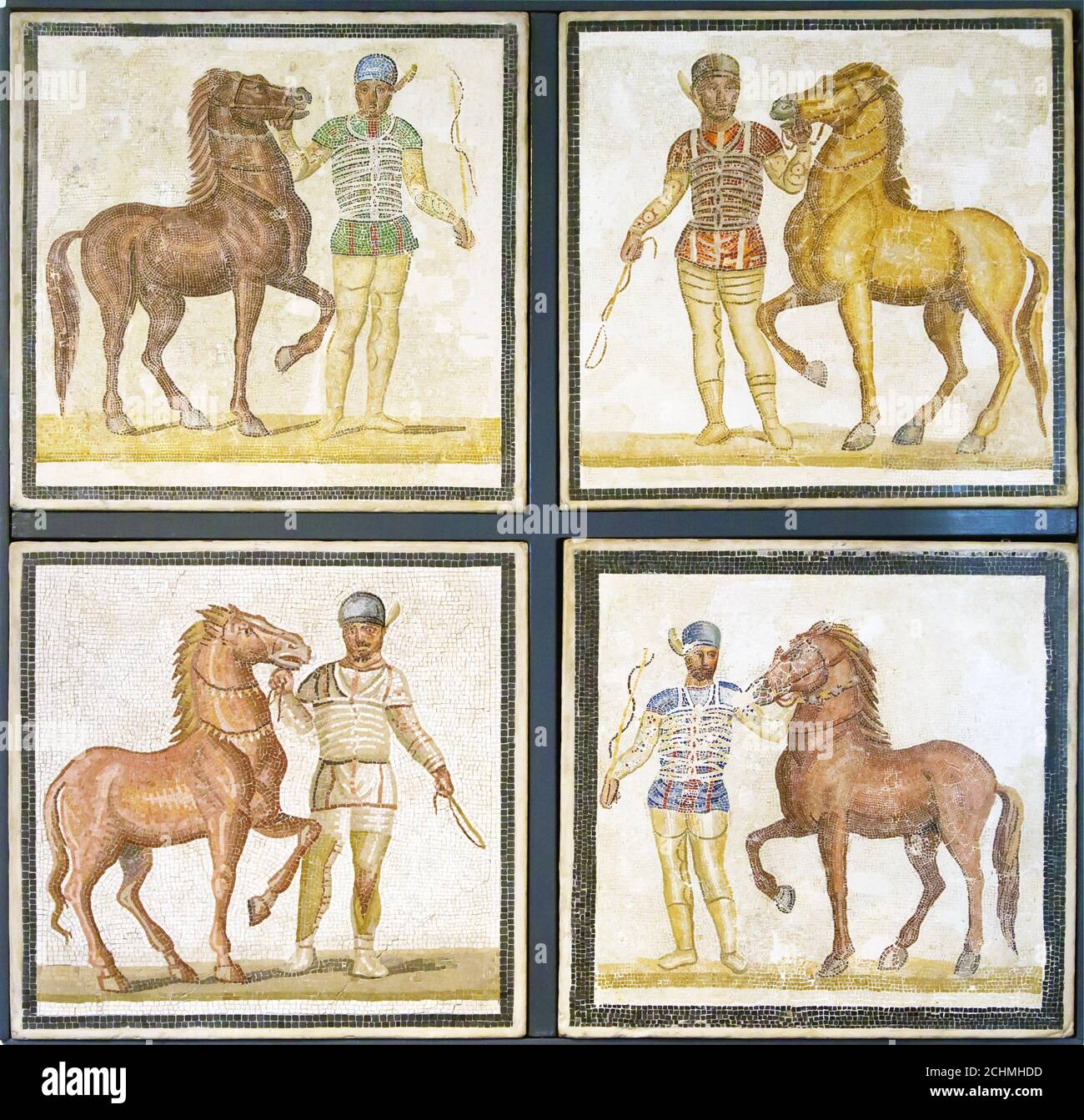 Roman mosaics of horses ready for a race Stock Photo