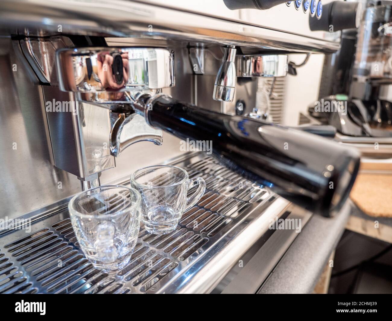 Espresso coffee machine, portafilter and cups. Close detail on the