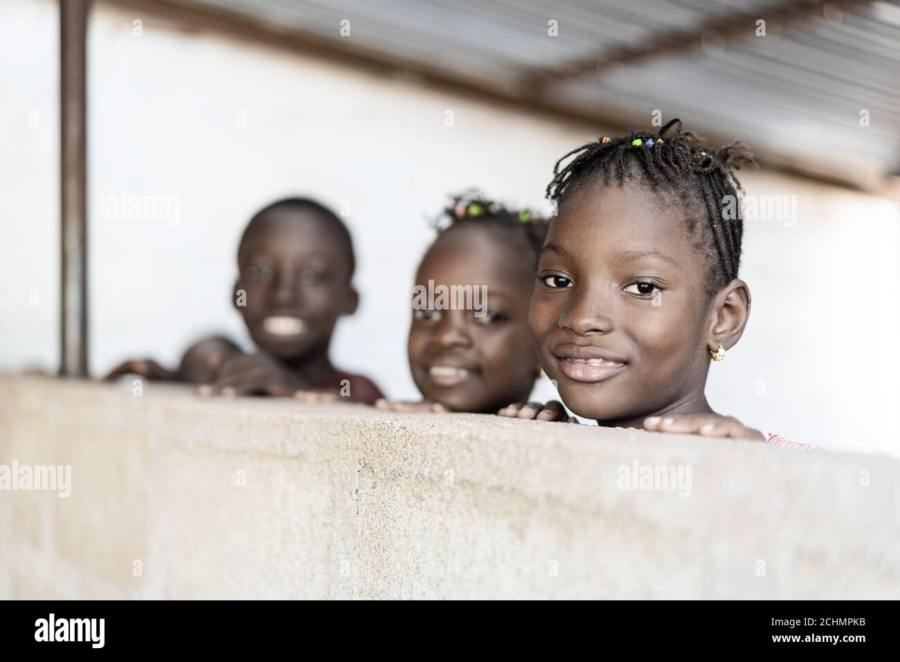 Three african boys smiling hi-res stock photography and images - Alamy