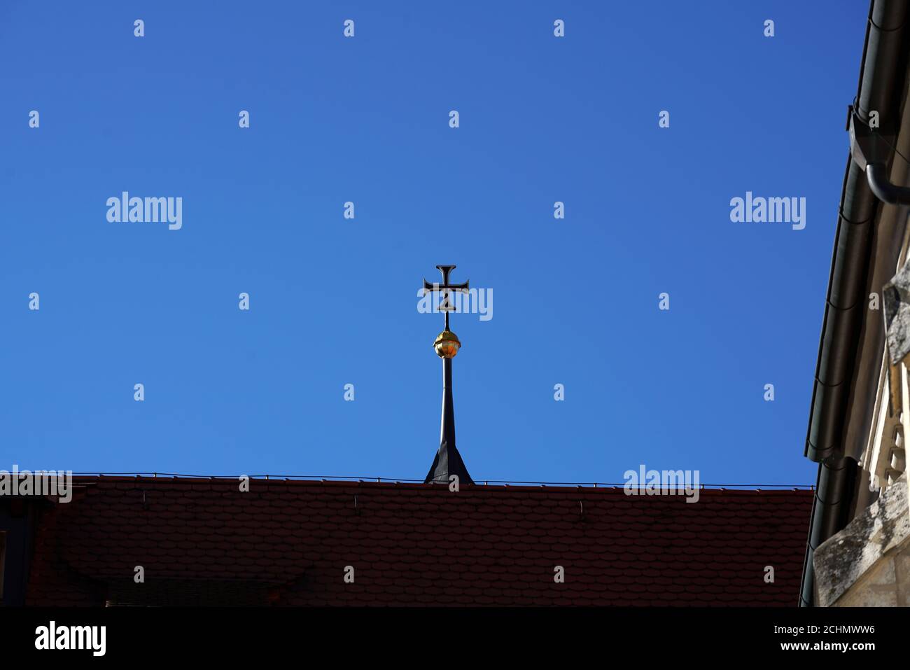 Low angle shot of a cross from the top of a church Stock Photo - Alamy