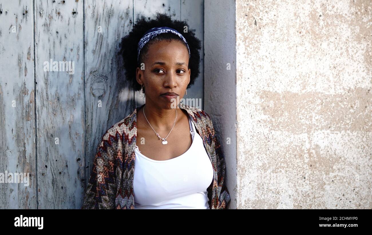 Young black woman serious hi-res stock photography and images - Alamy