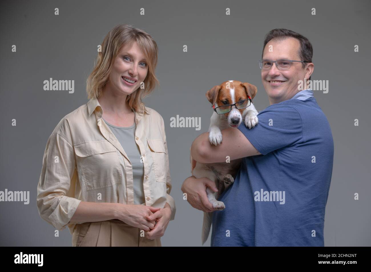Happy family in studio hi-res stock photography and images - Alamy