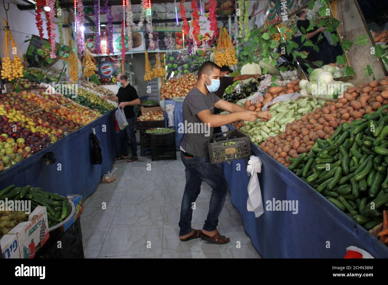 Gaza. 12th Sep, 2020. Workers prepare orders for customers to be delivered to their homes at a grocery store in Gaza City, on Sept. 12, 2020. Gazans have resorted to online shopping to buy necessities during the lockdown amid the COVID-19 outbreak. Credit: Rizek Abdeljawad/Xinhua/Alamy Live News Stock Photo