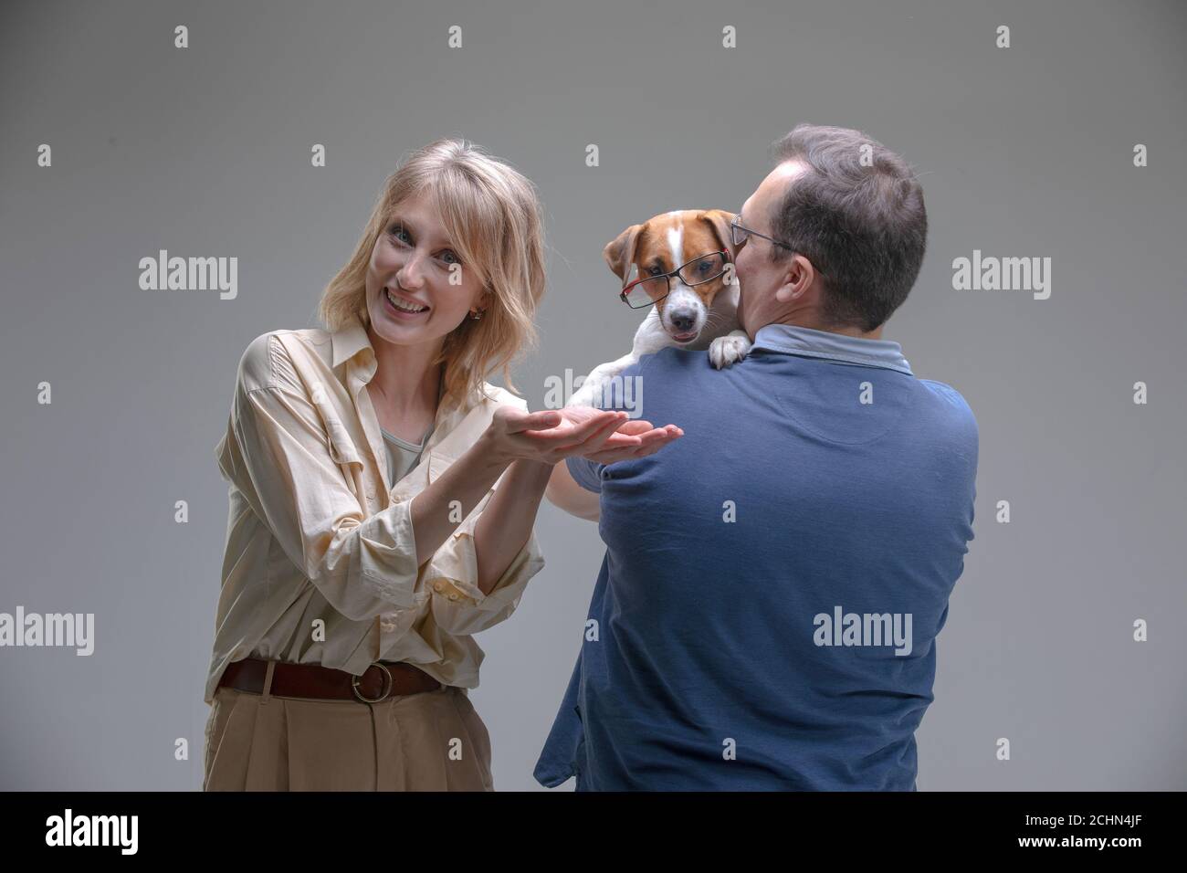Happy family in studio hi-res stock photography and images - Alamy