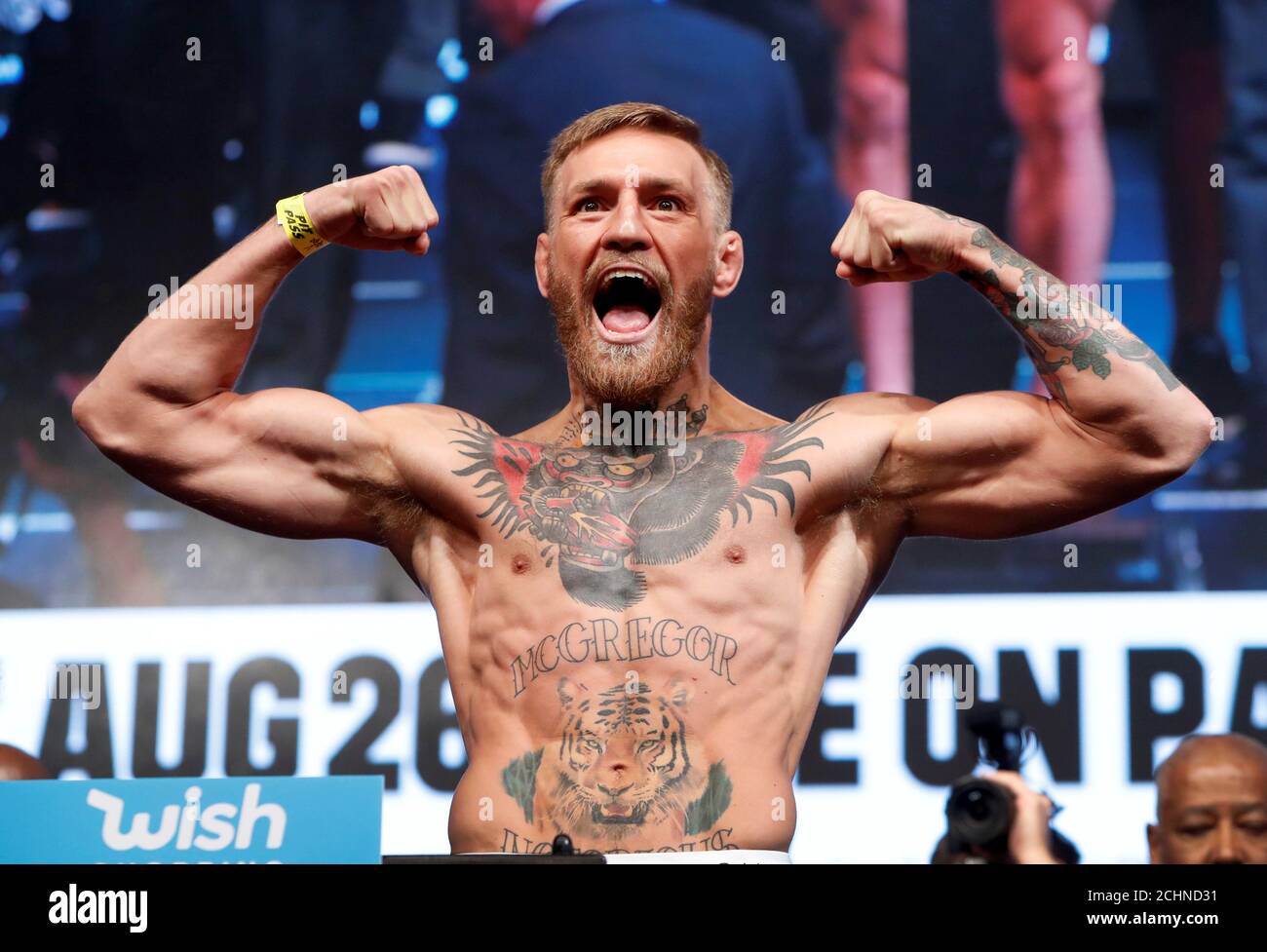 UFC lightweight champion Conor McGregor of Ireland poses on the scale  during their official weigh-in at T-Mobile Arena in Las Vegas, Nevada, U.S.  on August 25, 2017. REUTERS/Steve Marcus Stock Photo -