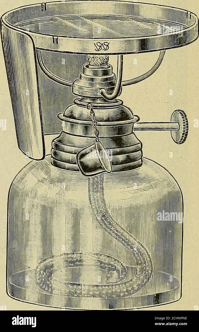 Operative and dental anatomy technics; a class-room and laboratory manual  for freshmen dental students . Fig. 120.—Ainsworth rubber dam punch. Fig. i  21 .—Alcohol lamp, flame shield and gold annealer. ADJUNCTS