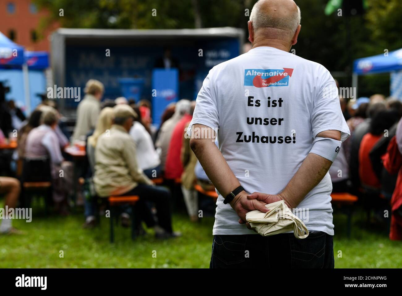 A supporter of the Alternative for Germany (AfD) wears a t-shirt reading 'It is our home' ('Es ist unser Zuhause') at the Gillamoos Fair, one of Bavaria's oldest fairs, in Abensberg, Germany September 2, 2019. REUTERS/Andreas Gebert Stock Photo
