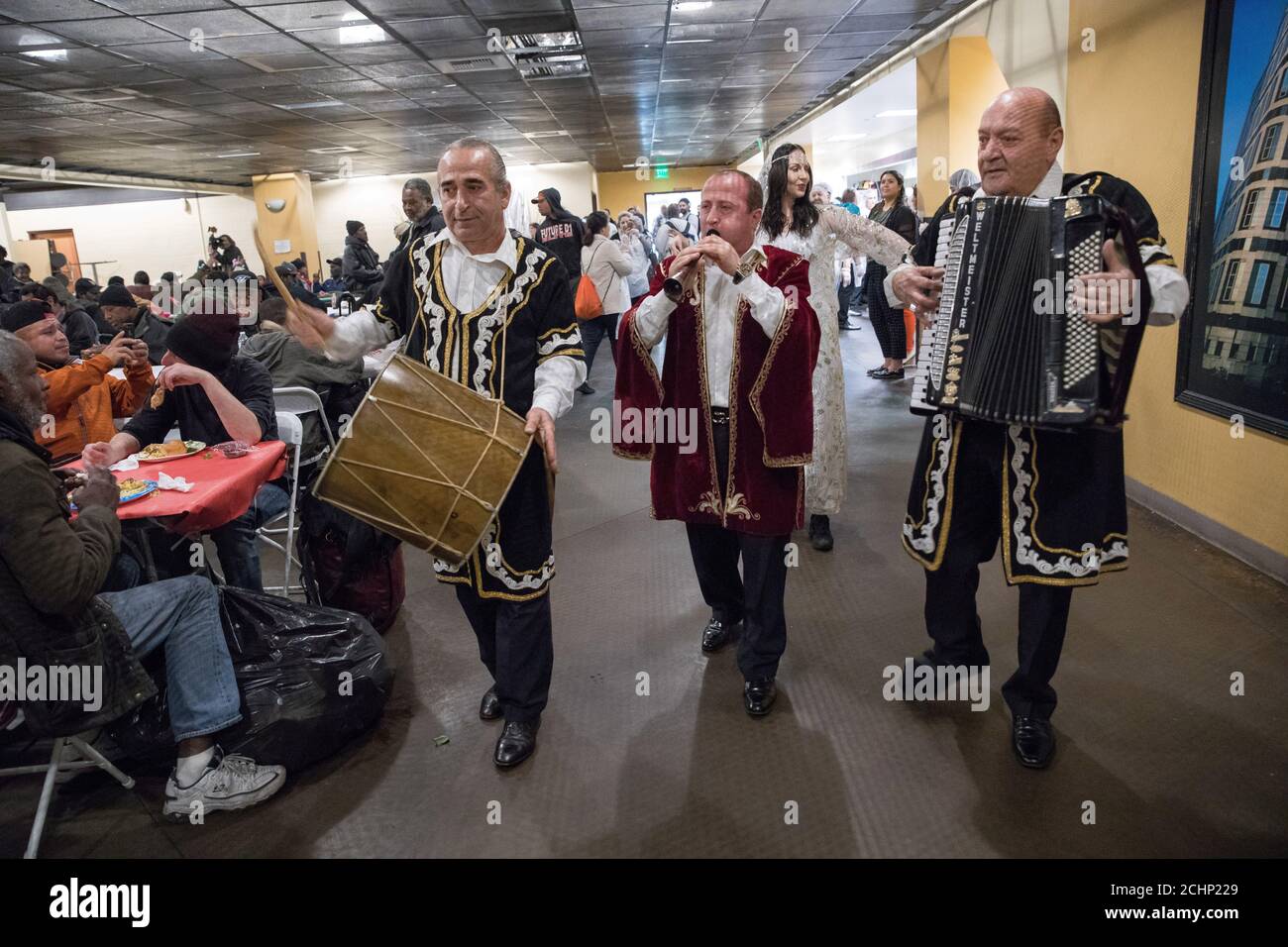 Traditional Musicians And Dancers Entertained As Iranian American Volunteers Cook And Serve Food For Homeless And Near Homeless People At Midnight Mission Shelter On Skid Row To Celebrate Nowruz Iranian New Year In Los Traditional Musicians And Dancers Entertained As Iranian American Volunteers Cook And Serve Food For Homeless And Near Homeless People At Midnight Mission Shelter On Skid Row To Celebrate Nowruz Iranian New Year In Los