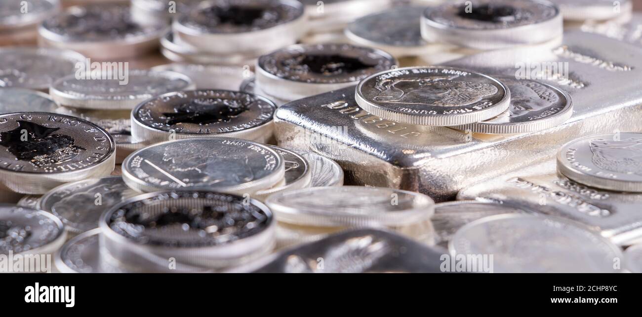 Closeup of Silver bars and coins Stock Photo - Alamy