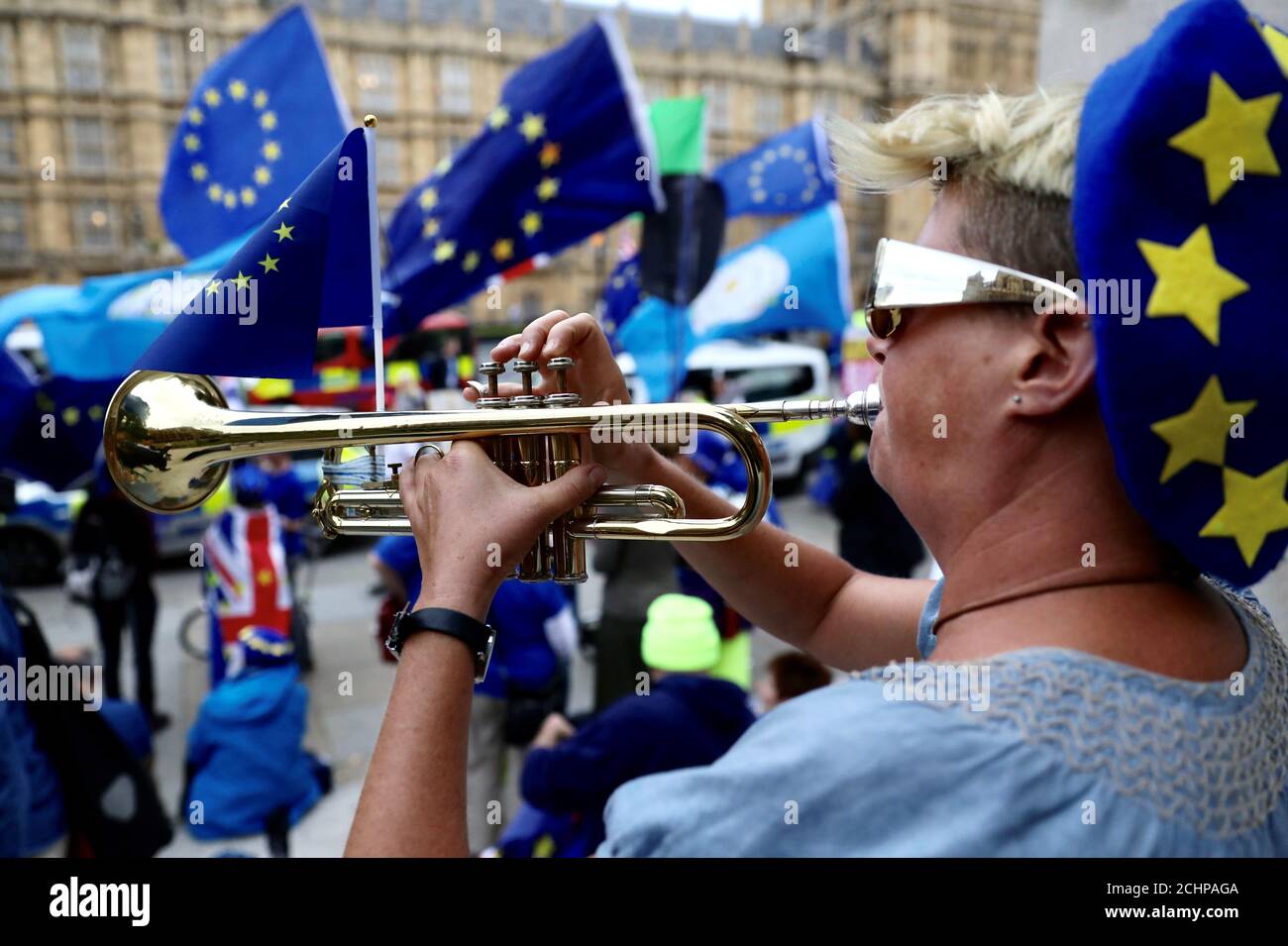 Sarah Woolfenden plays a trumpet outside the Houses of Parliament in London, Britain September 3, 2019.  REUTERS/Kevin Coombs Stock Photo