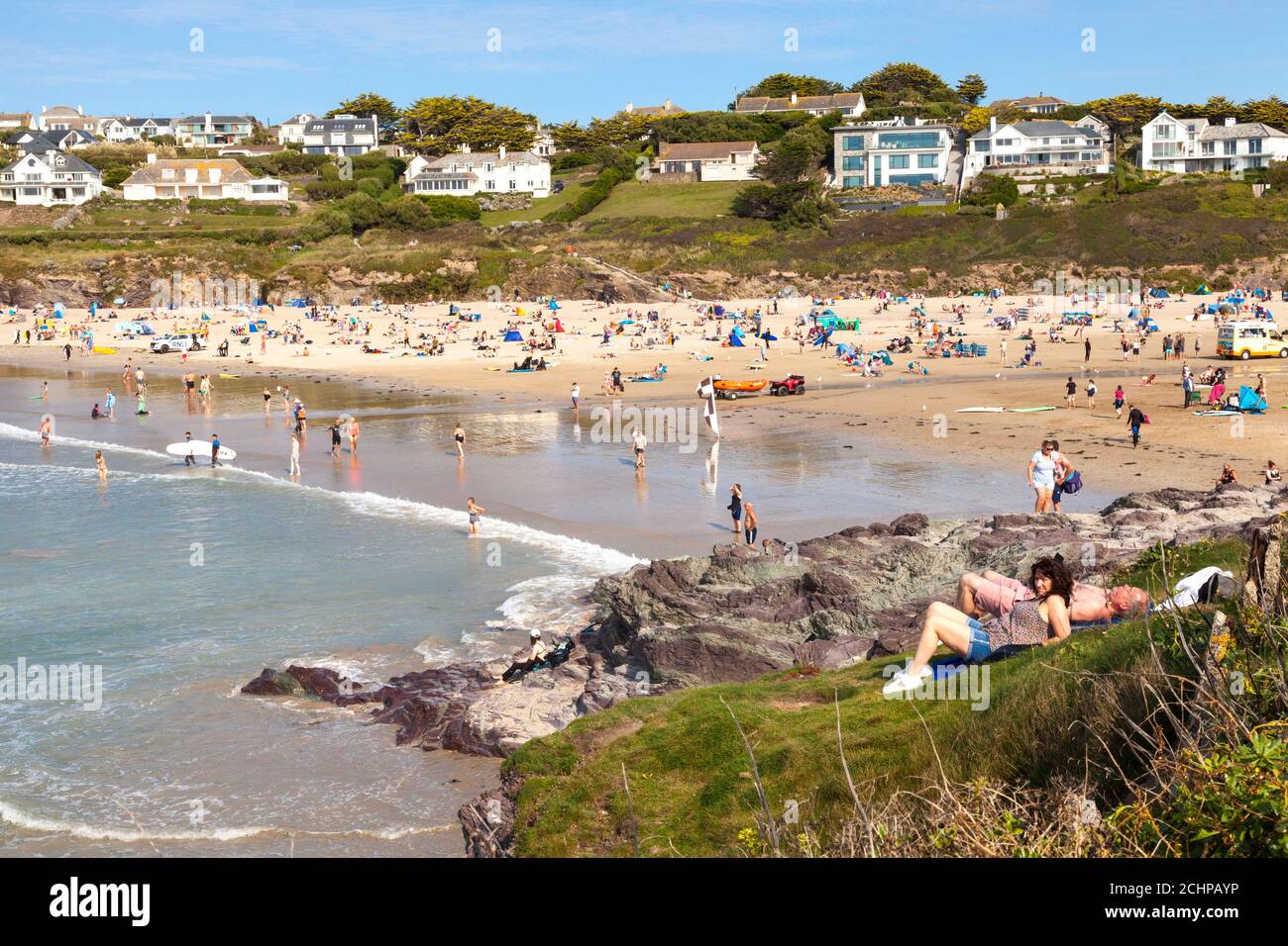 Polzeath, Cornwall, UK. 14th September 2020.  Holidaymakers enjoy warm sunshine  on Polzeath Beach on North Cornwall's Atlantic coast. Stock Photo