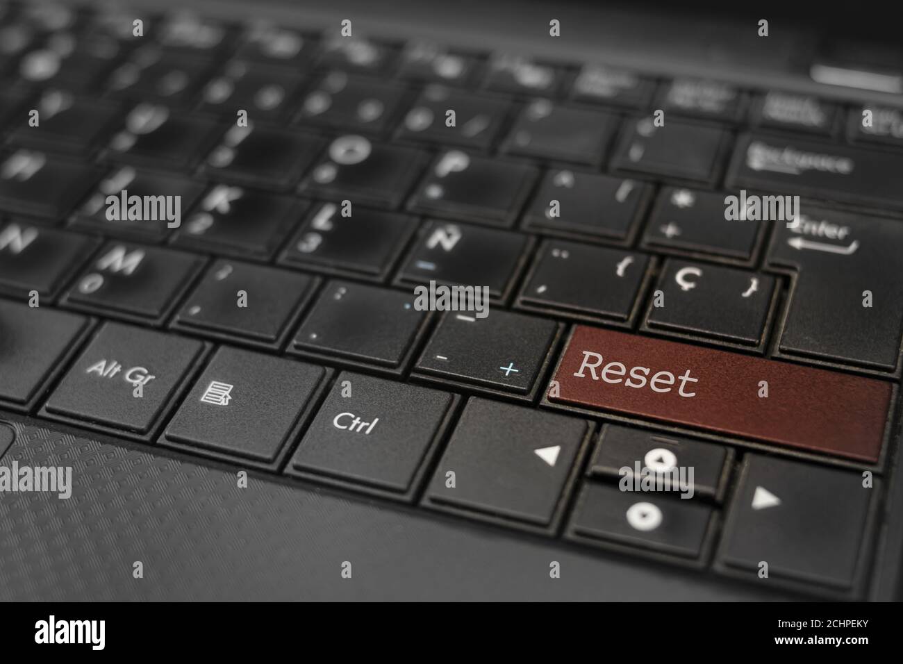 Reset concept. Reset key embedded in a computer keyboard Stock Photo