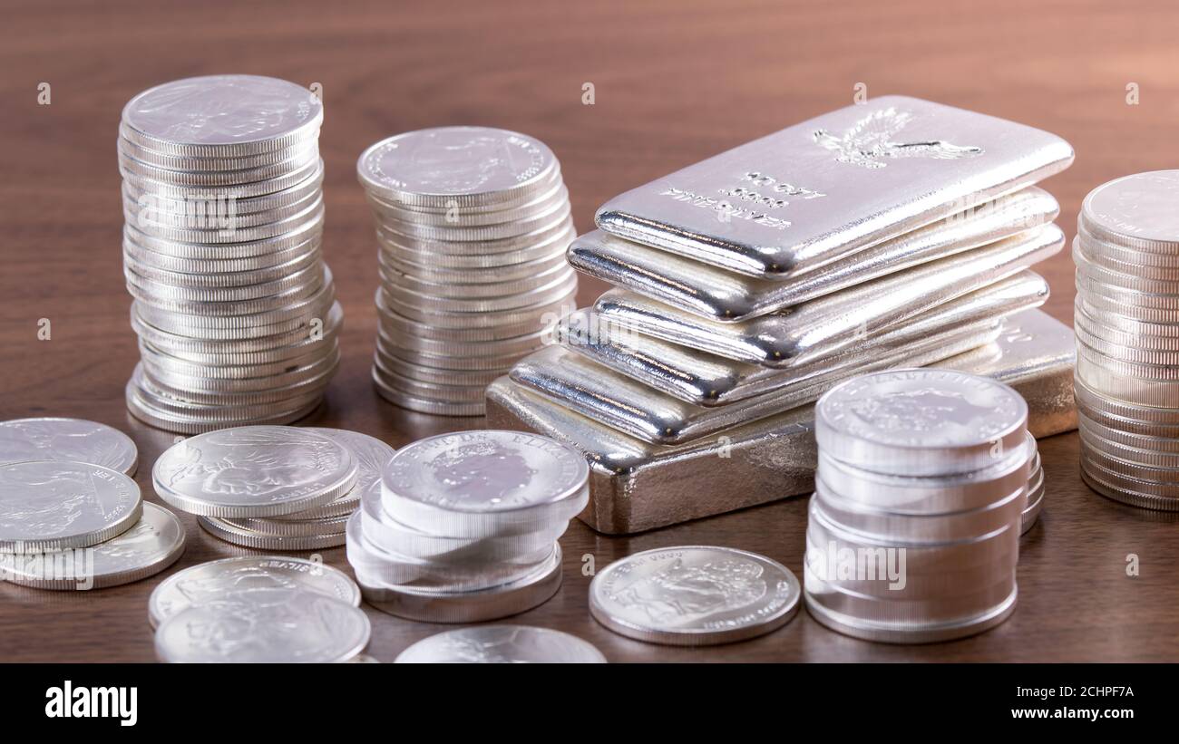 Silver coins stacked hi-res stock photography and images - Alamy