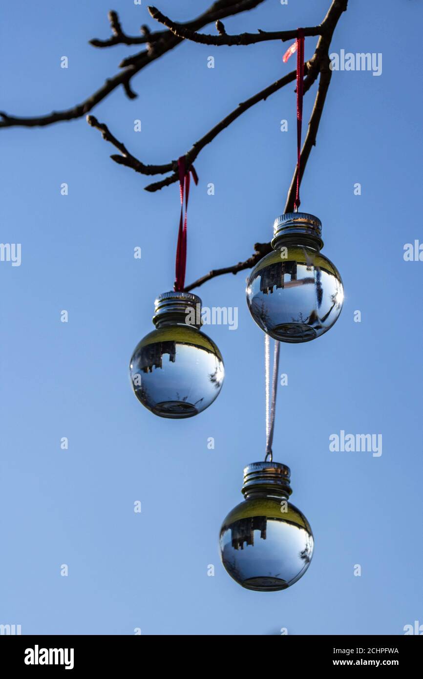 old ruin reflected upside down in christmas baubles Stock Photo