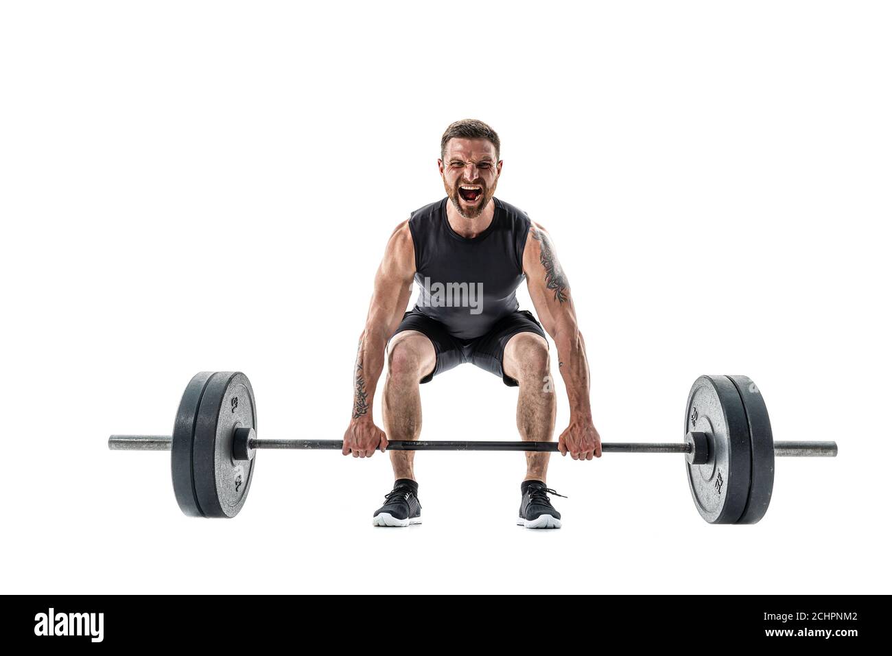 Aggressive bearded strong muscular Man in sportswear Doing A Deadlift  Exercise. Full length studio shot isolated on white Stock Photo - Alamy